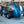 Blue Shelby Cobra race car with number 98 at a track