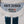 Close-up of a GT350 graphic and Red X Thread label on a white fleece sweatshirt with blue stripes.